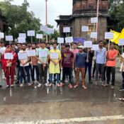 Ramdoot Restores volunteers holding placards during a temple awareness rally promoting cultural and heritage preservation.